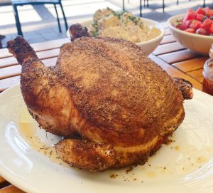 A whole pit-smoked chicken at the Roadhouse
